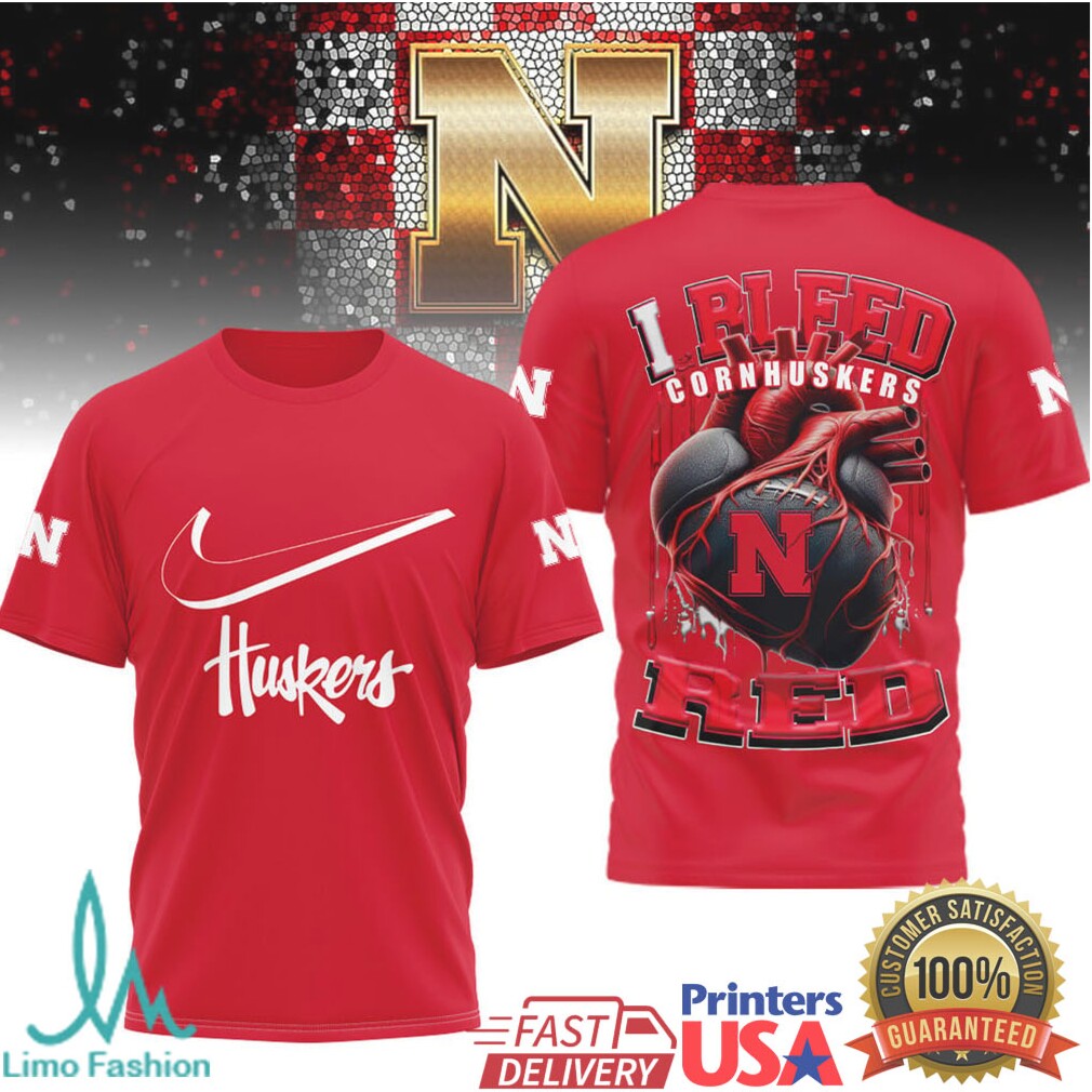 Nebraska Cornhuskers “I Bleed Red” Heart Football T Shirt - Limotees LLC