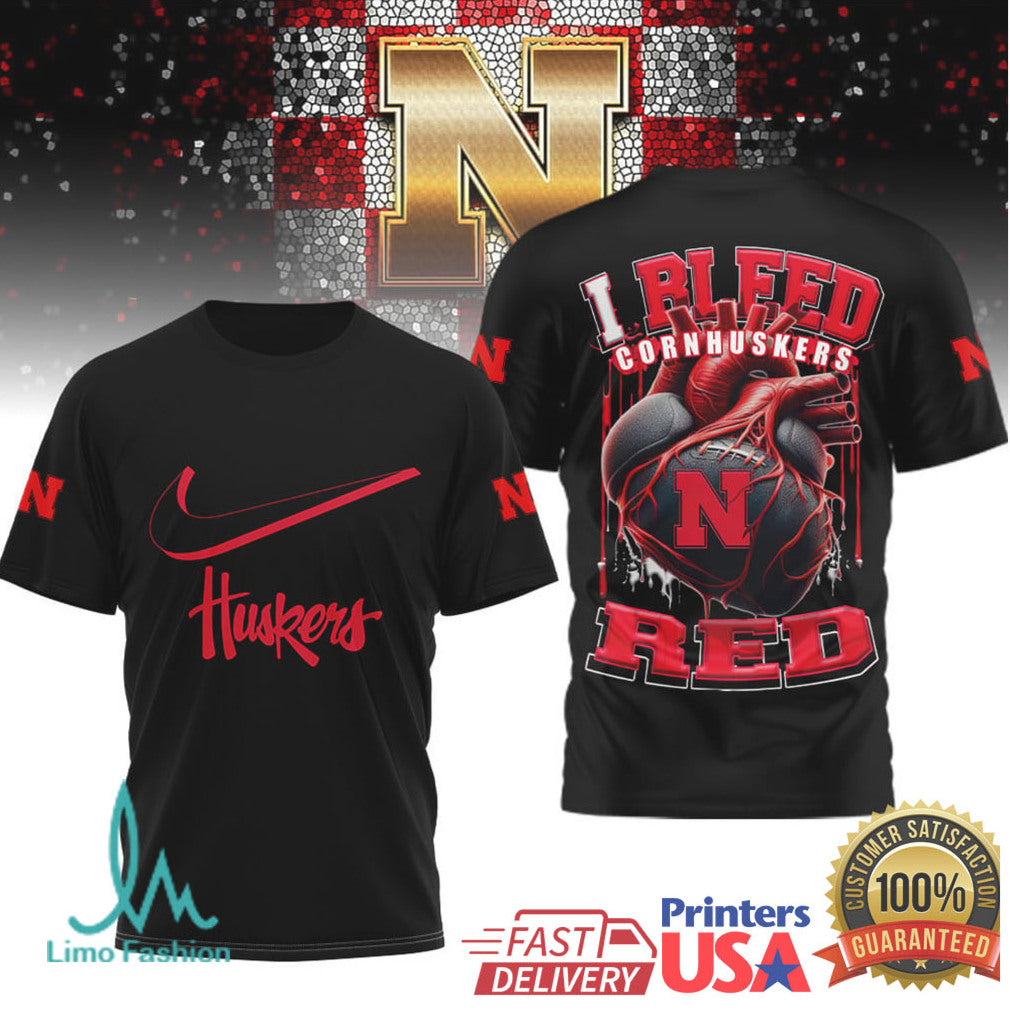 Nebraska Cornhuskers “I Bleed Red” Heart Football T Shirt - Limotees LLC